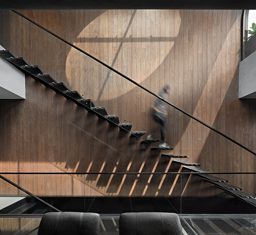 k thengono punctures holes from above to maintain well lit interior for a small tech start up office 5