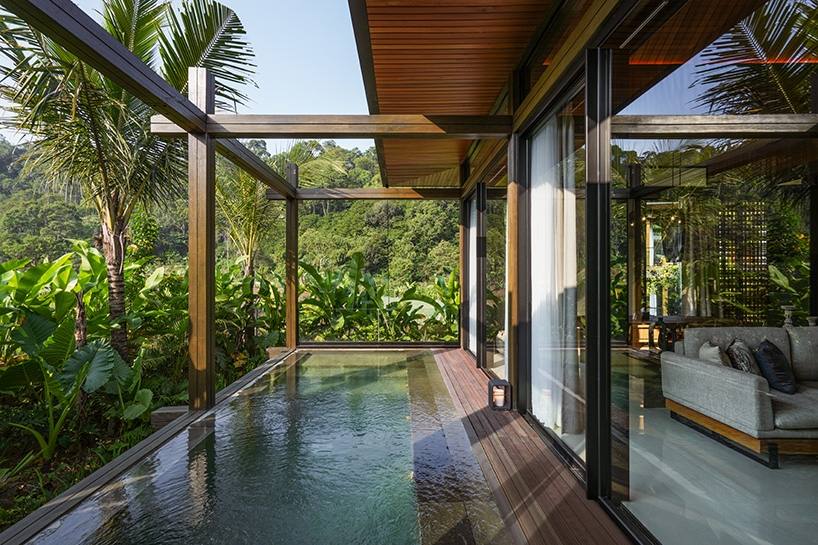 undulating wood and bamboo top k-thengono's wedding compound in indonesia countryside 