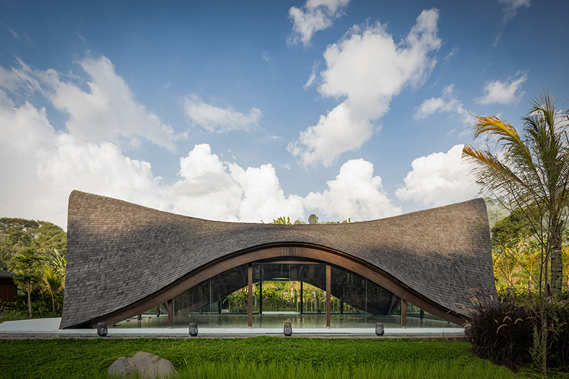 undulating wood and bamboo top k-thengono's wedding compound in indonesia countryside 