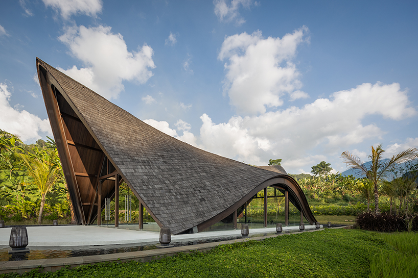 undulating wood and bamboo top k-thengono's wedding compound in indonesia countryside 