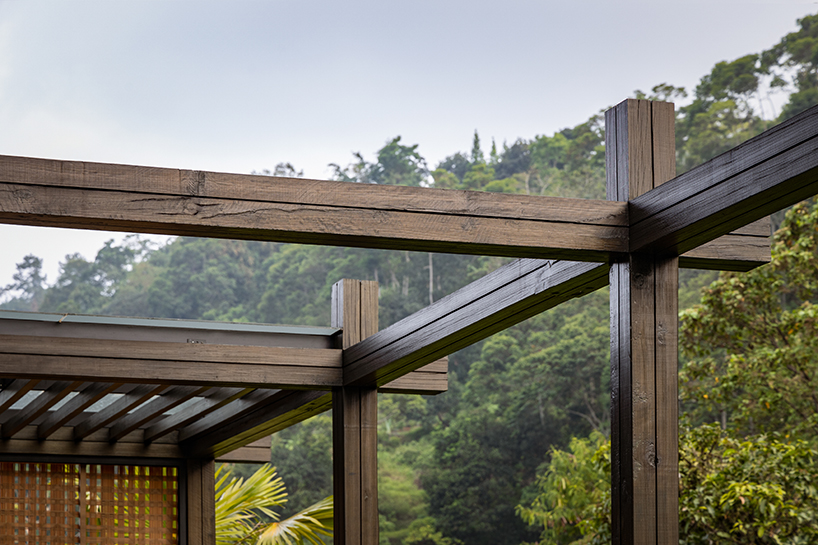 undulating wood and bamboo top k-thengono's wedding compound in indonesia countryside 