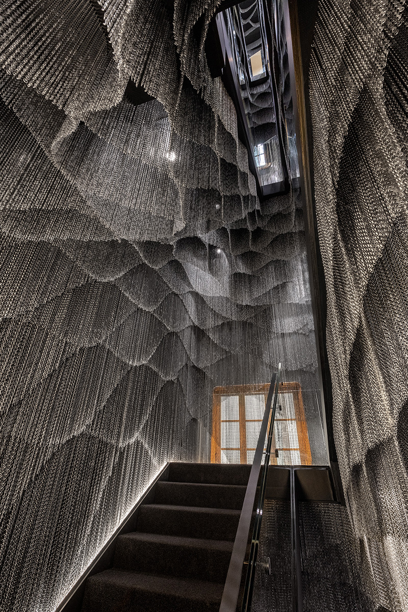 kengo kuma installs aluminum chain staircase inside gaudí's casa batlló designboom