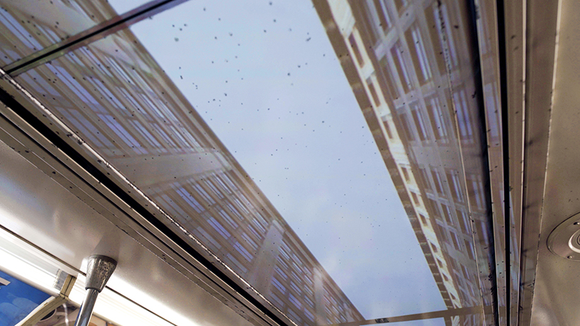 ian callender projects new york cityscape on the ceiling of moving subway trains