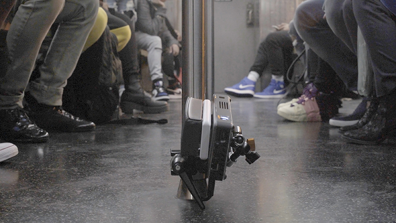 ian callender projects new york cityscape on the ceiling of moving subway trains