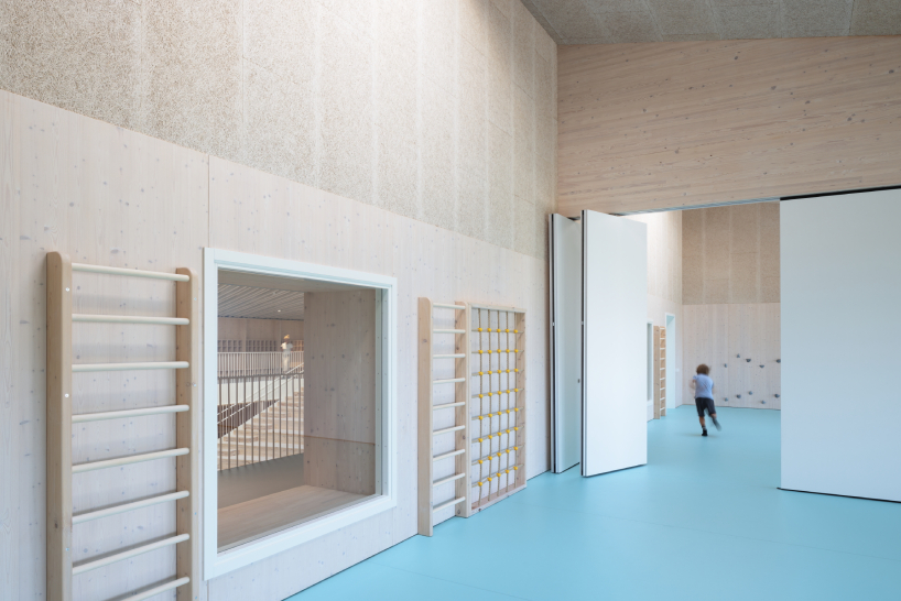 MADE arhitekti's timber kindergarten in latvia is the baltic states’ first public passive house building