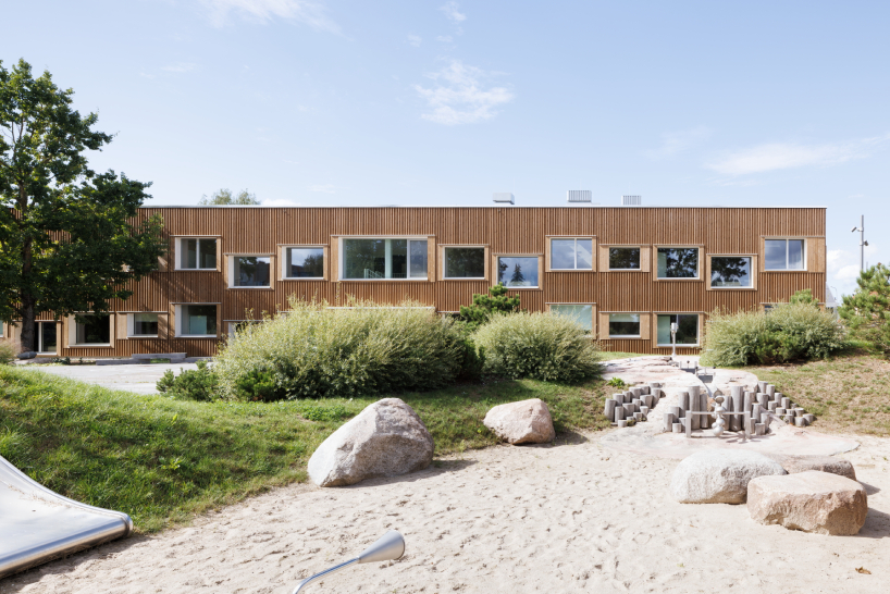 MADE arhitekti's timber kindergarten in latvia is the baltic states’ first public passive house building