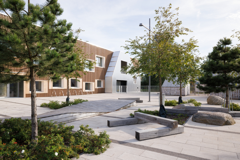 MADE arhitekti's timber kindergarten in latvia is the baltic states’ first public passive house building