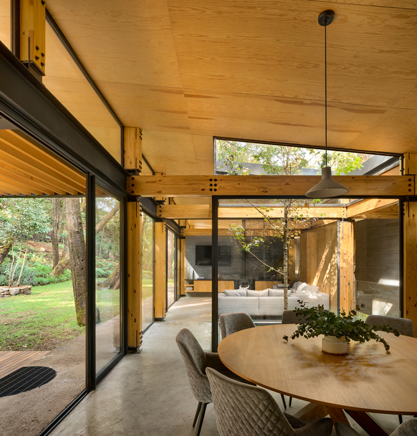 casa el pinar a sustainable wood house hidden in the forest 5