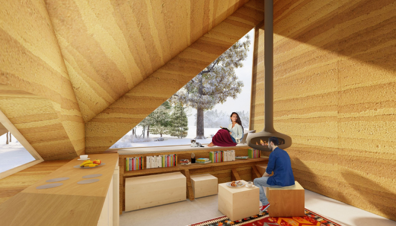 angular green roof blending into the scenery tops rammed earth cabin in slovenia