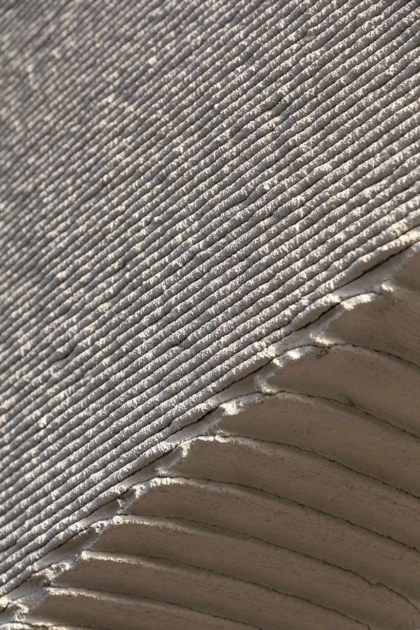 COLLARCH's concrete, 3D printed bus stop forms sculptural shelter in slovakia