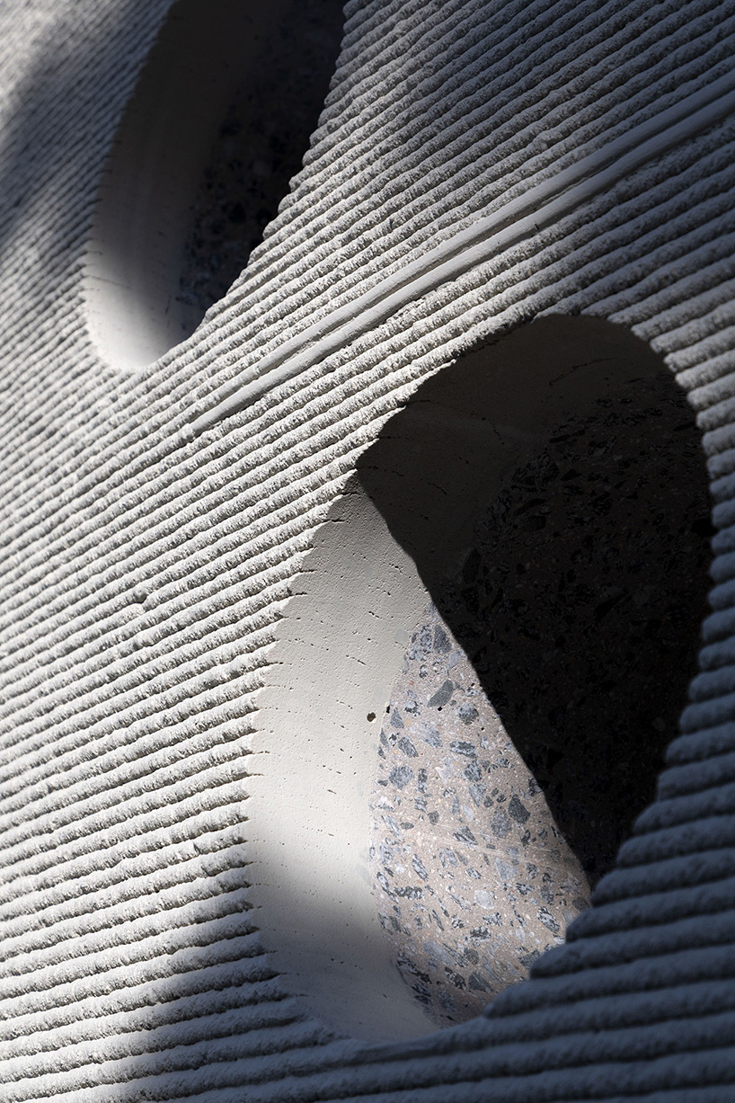 COLLARCH's concrete, 3D printed bus stop forms sculptural shelter in slovakia