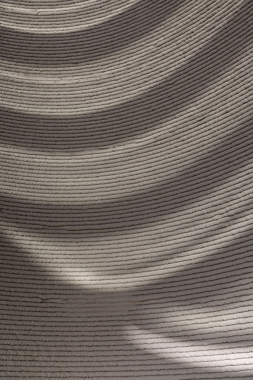 COLLARCH's concrete, 3D printed bus stop forms sculptural shelter in slovakia