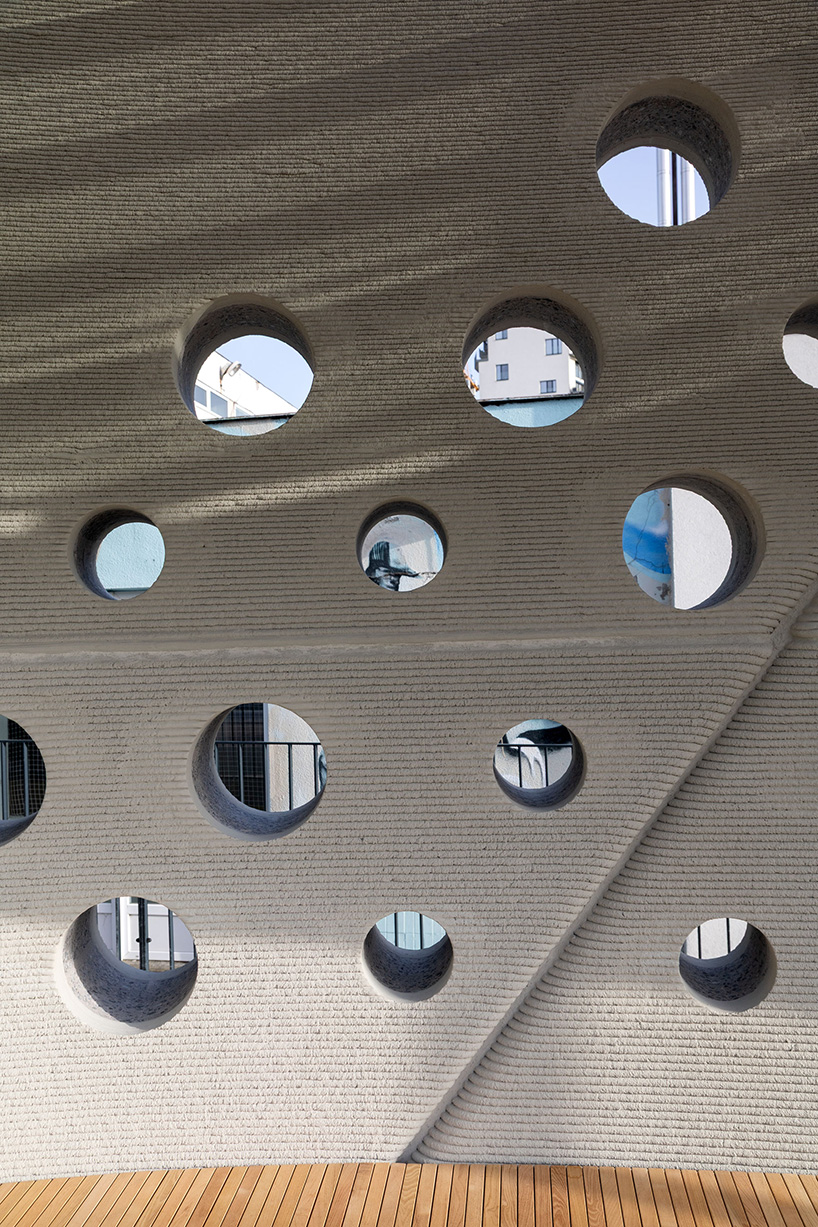 COLLARCH's concrete, 3D printed bus stop forms sculptural shelter in slovakia