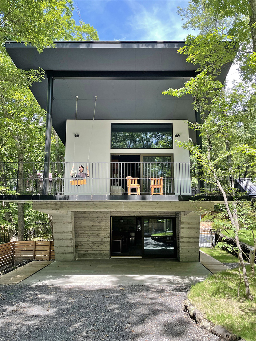 yuji tanabe builds ship-like dwelling among woodland area in japan