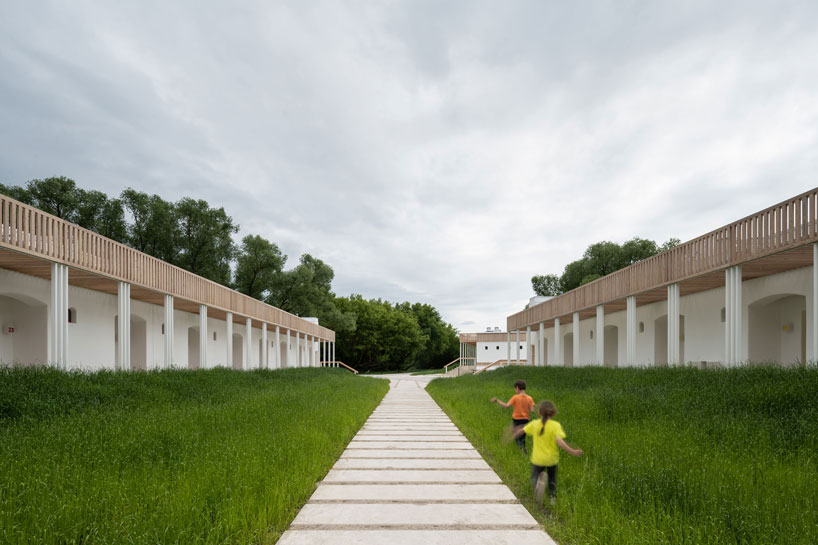 megabudka's hotel emerges as a cluster of slavic mud modules in russian national park 