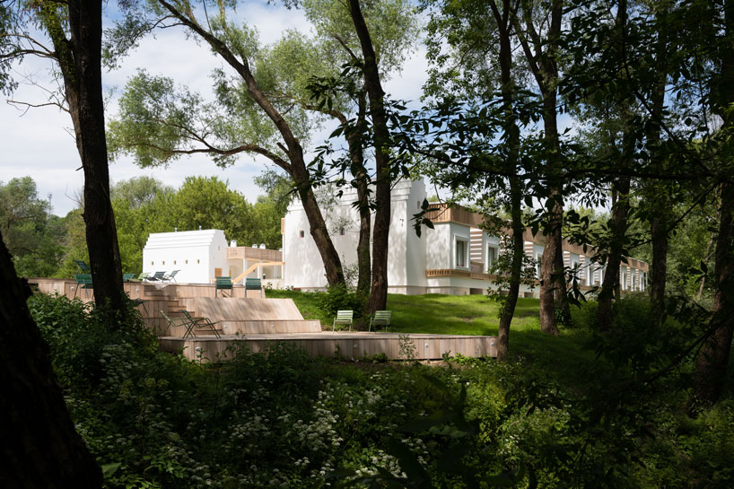 megabudka's hotel emerges as a cluster of slavic mud modules in russian national park 