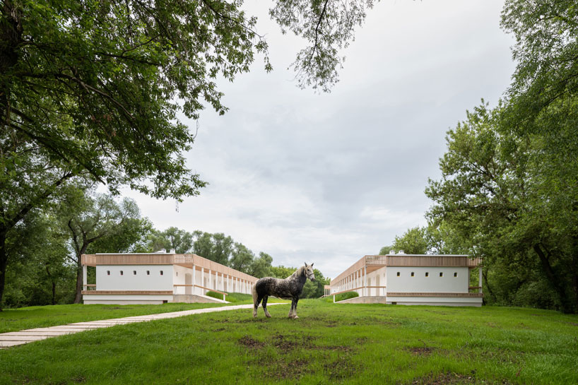 megabudka's hotel emerges as a cluster of slavic mud modules in russian national park 