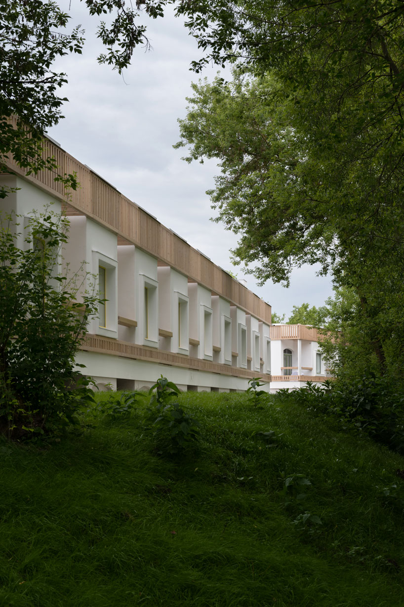 megabudka's hotel emerges as a cluster of slavic mud modules in russian national park 