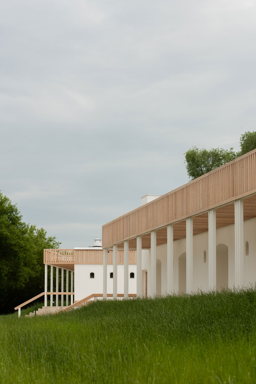 megabudka's hotel emerges as a cluster of slavic mud modules in russian national park 