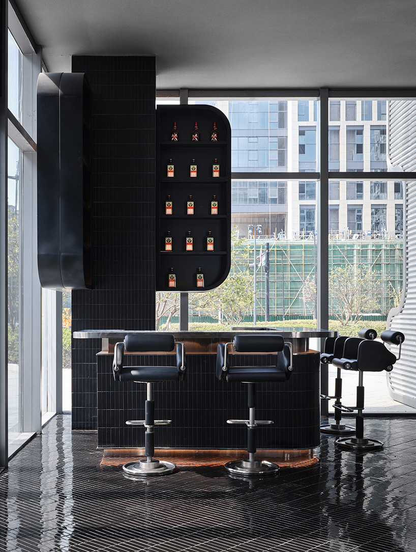 organic lights, mirrors & dark hues complete restaurant renovation by PIG design in hangzhou