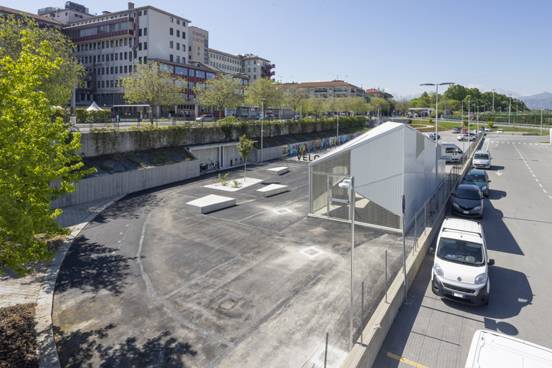 triangular geometries and gridded textures shape studio 3mark’s bike station in italy