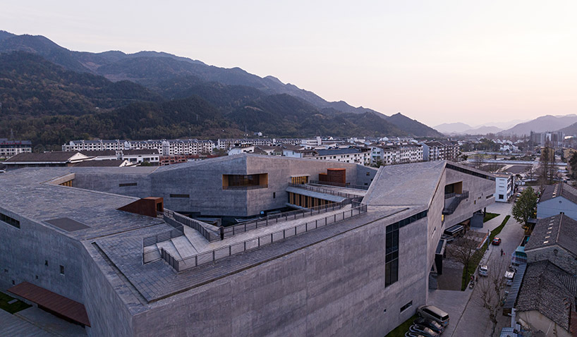 zhejiang lishui guyanhuaxiang art center by line+ spreads a fragmented ring formation