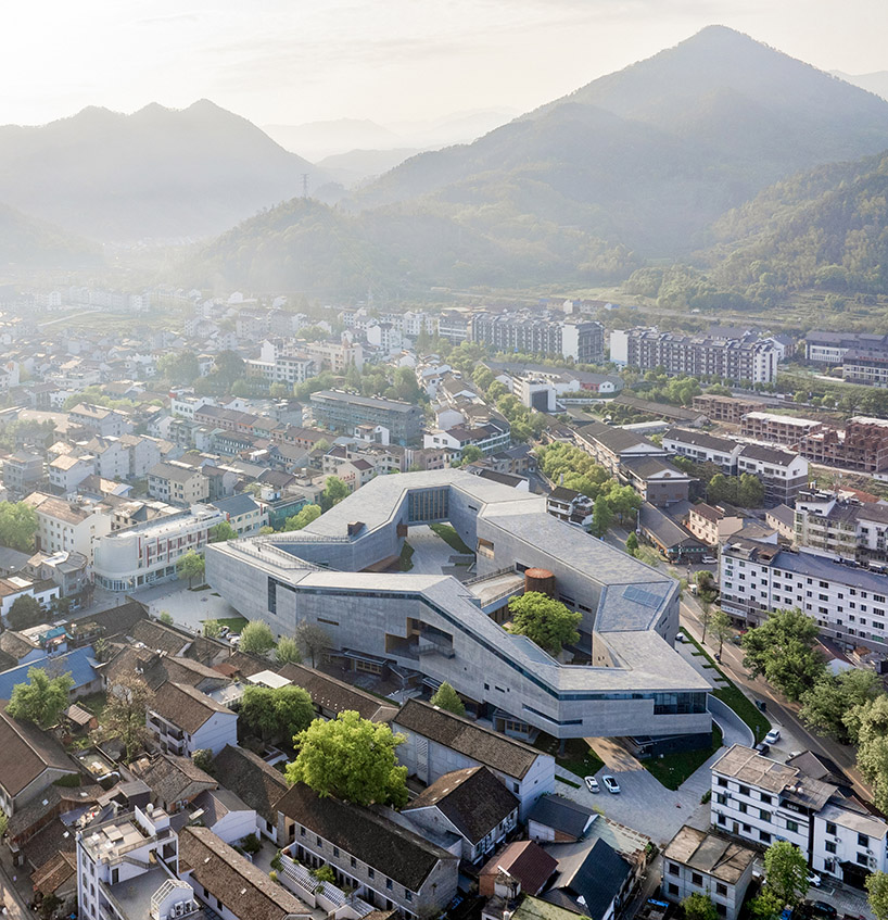 zhejiang lishui guyanhuaxiang art center by line+ spreads a fragmented ring formation