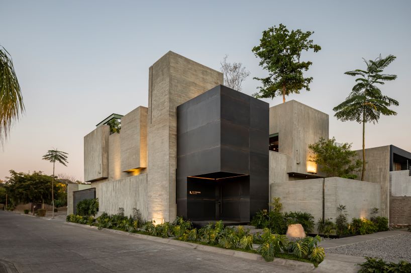assemblage of concrete, stone, and steel blocks shape di frenna arquitectos' mexico office