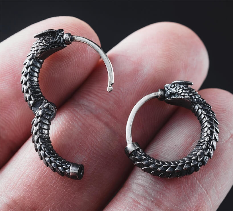 brass rattlesnake earrings by coppertist.wu capture ancient symbol of hope + eternity