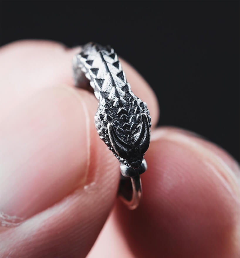 brass rattlesnake earrings by coppertist.wu capture ancient symbol of hope + eternity