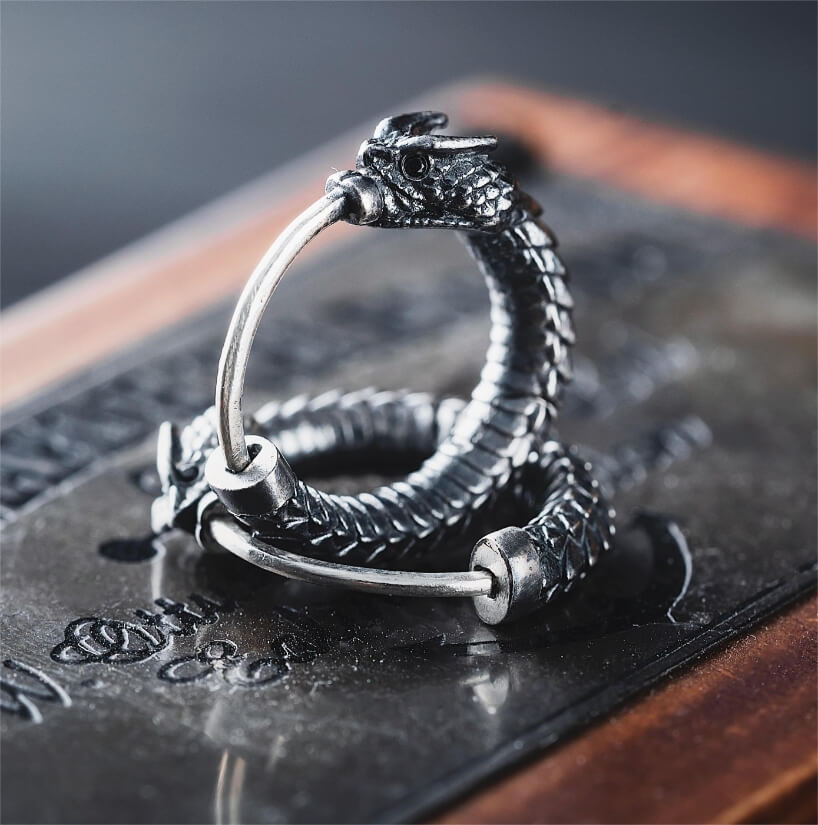 brass rattlesnake earrings by coppertist.wu capture ancient symbol of hope + eternity