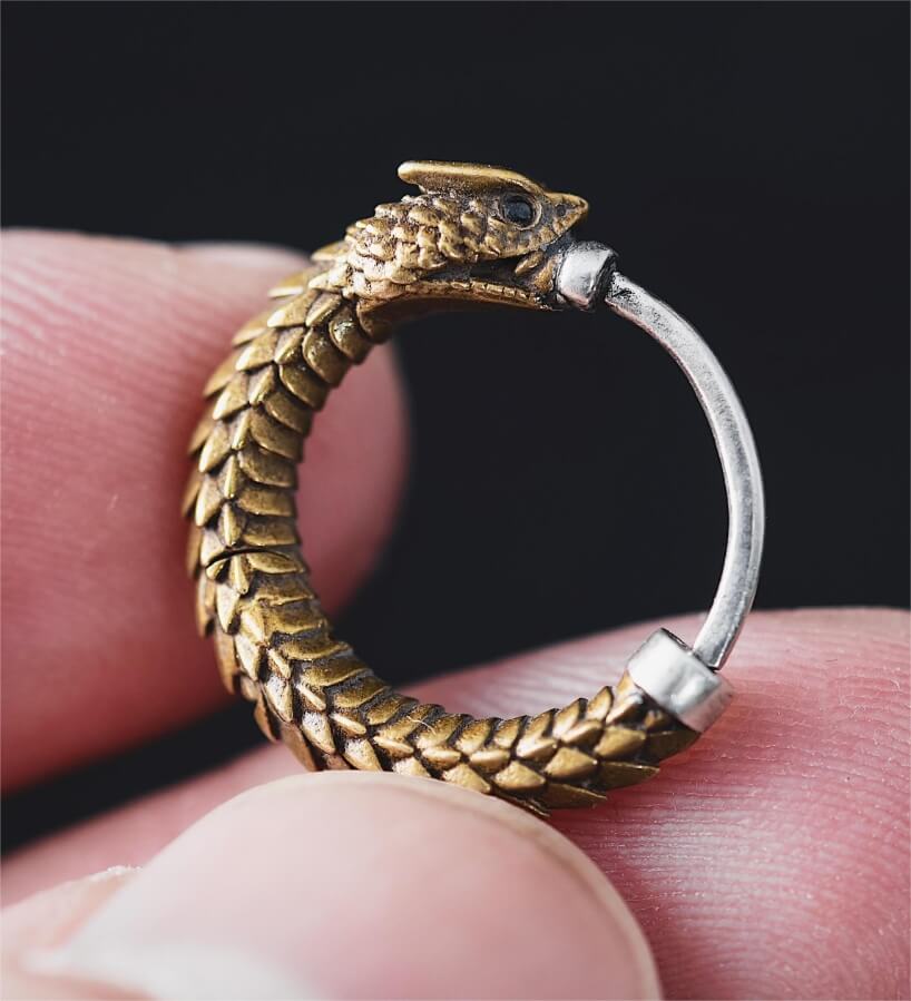 brass rattlesnake earrings by coppertist.wu capture ancient symbol of hope + eternity