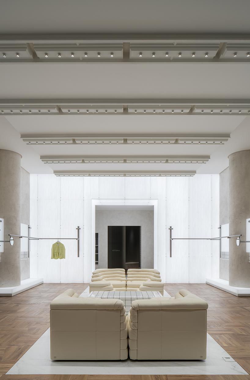 fei design's pushBUTTON store in china is wrapped in a monochrome geometric facade