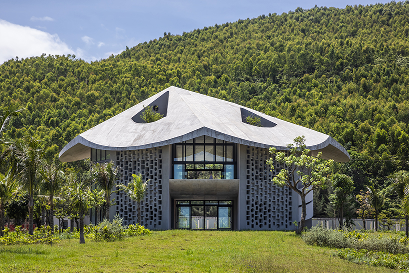 living and working spaces coexist under a roof amid vietnamese coastal landscape 1