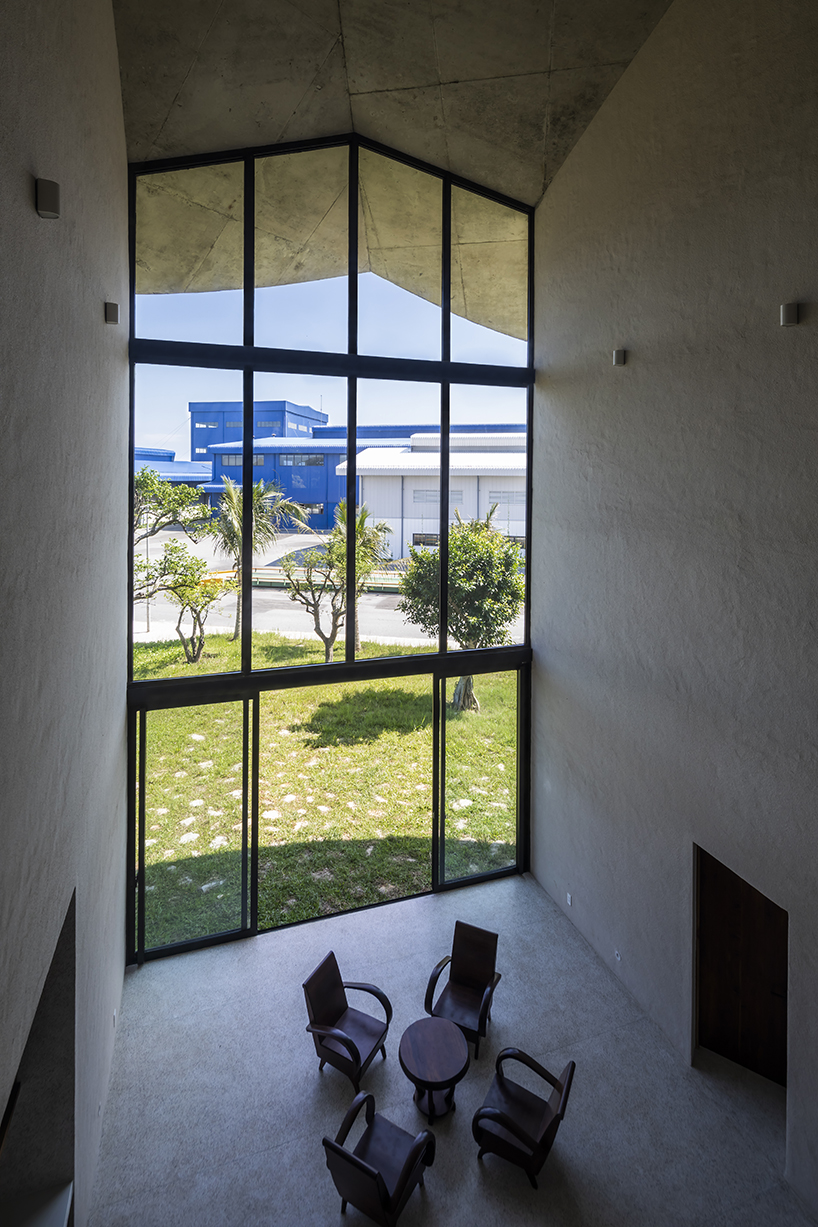 living and working spaces coexist under a roof amid vietnamese coastal landscape 8