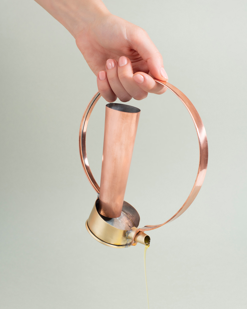 ‘famiglia oliva’ by astrid luglio preserves traditional italian craftsmanship to enhance oil tasting experience