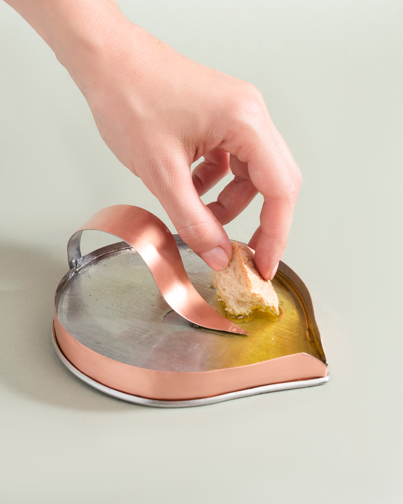 ‘famiglia oliva’ by astrid luglio preserves traditional italian craftsmanship to enhance oil tasting experience