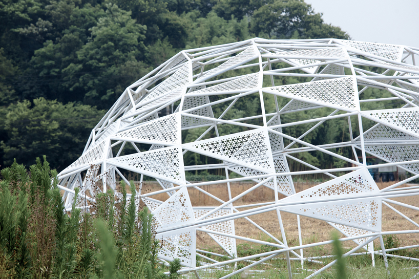dream installation by penda assembles lace-like patterns out of welded metal