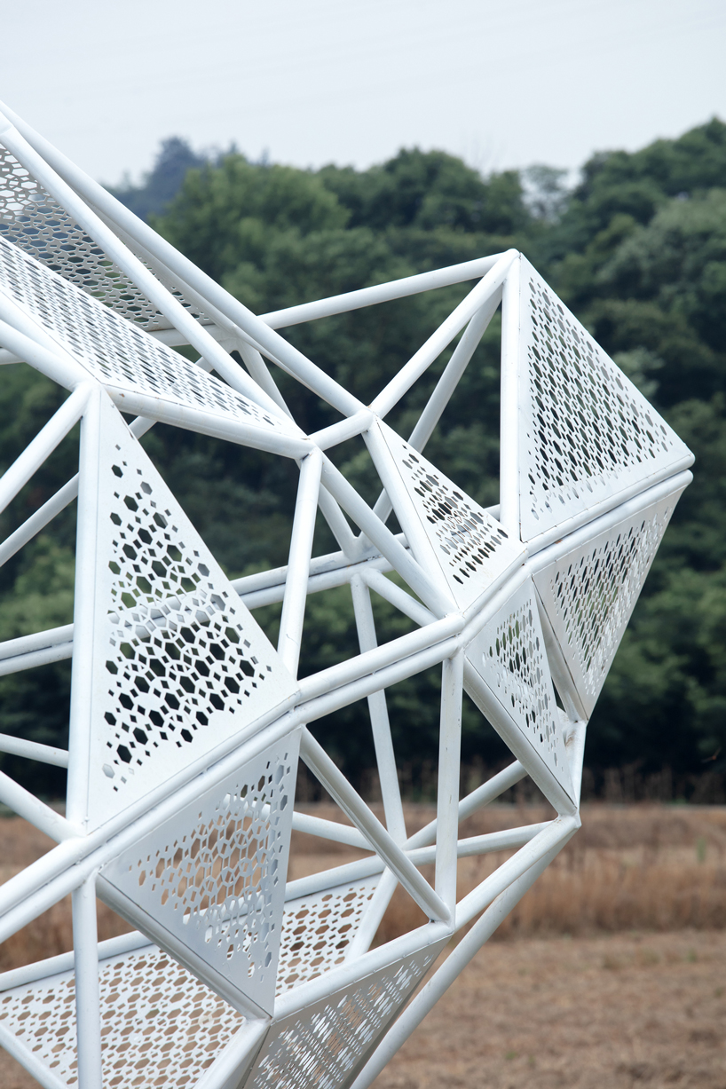 dream installation by penda assembles lace-like patterns out of welded metal