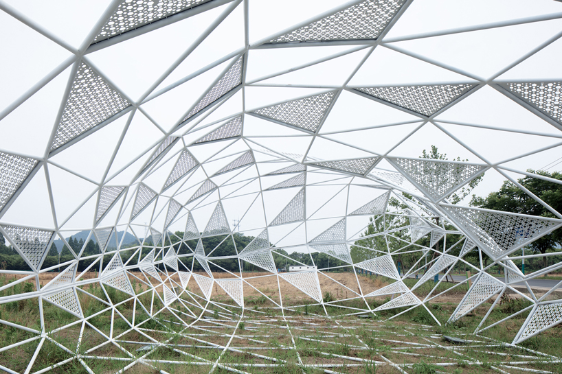dream installation by penda assembles lace-like patterns out of welded metal