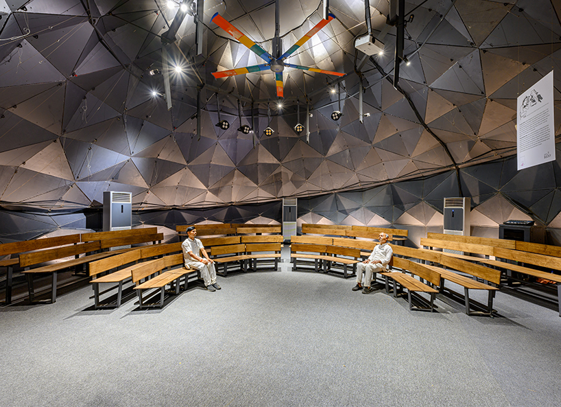 parametric metal tent with ridge paneled facade serves as multipurpose events space by andblack studio in india