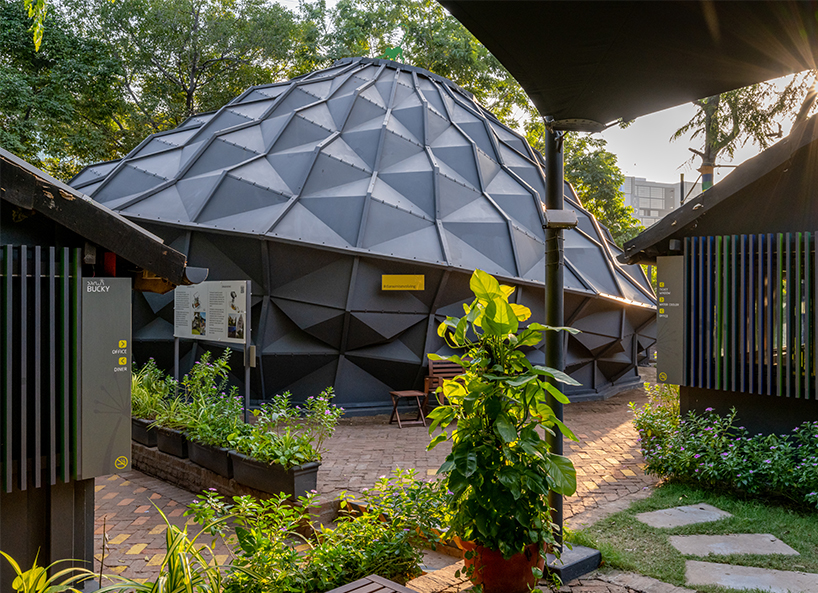 parametric metal tent with ridge paneled facade serves as multipurpose events space by andblack studio in india