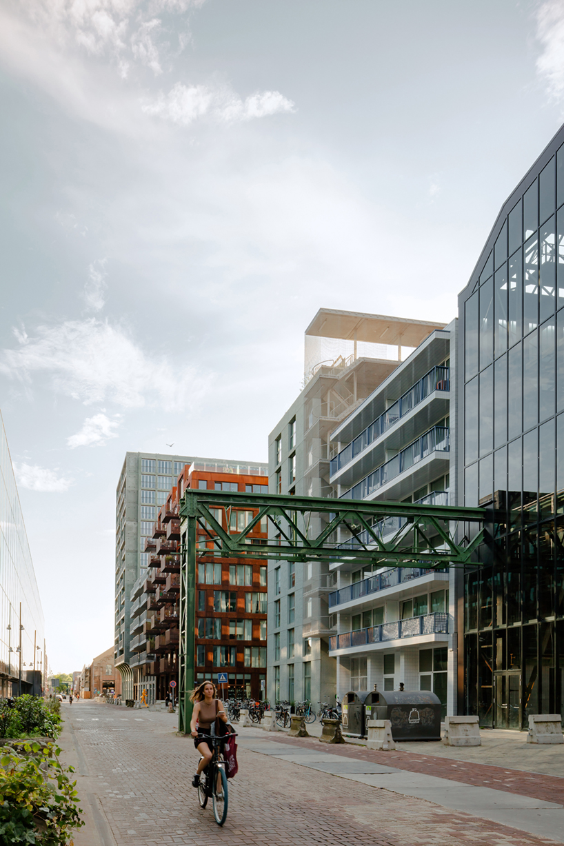 studioninedots' oostenburg island replan blends industrial heritage with urban density