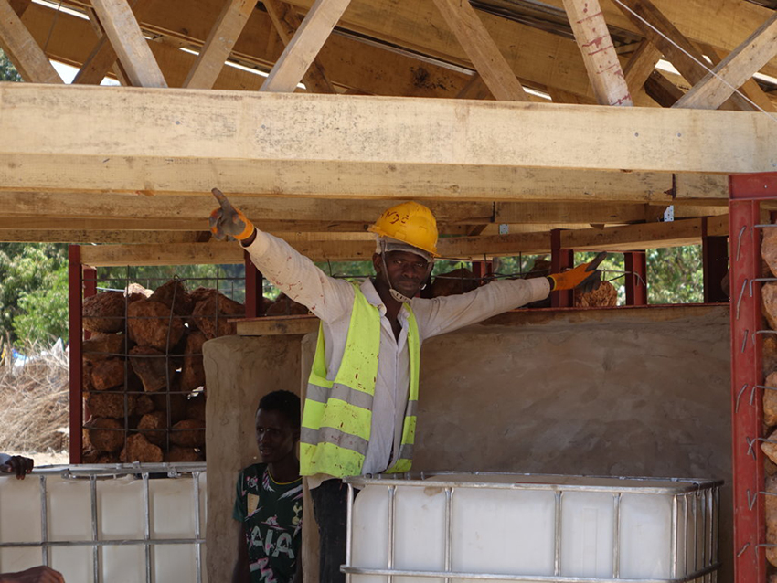 a well with stone architecture to facilitate access to drinking water 11