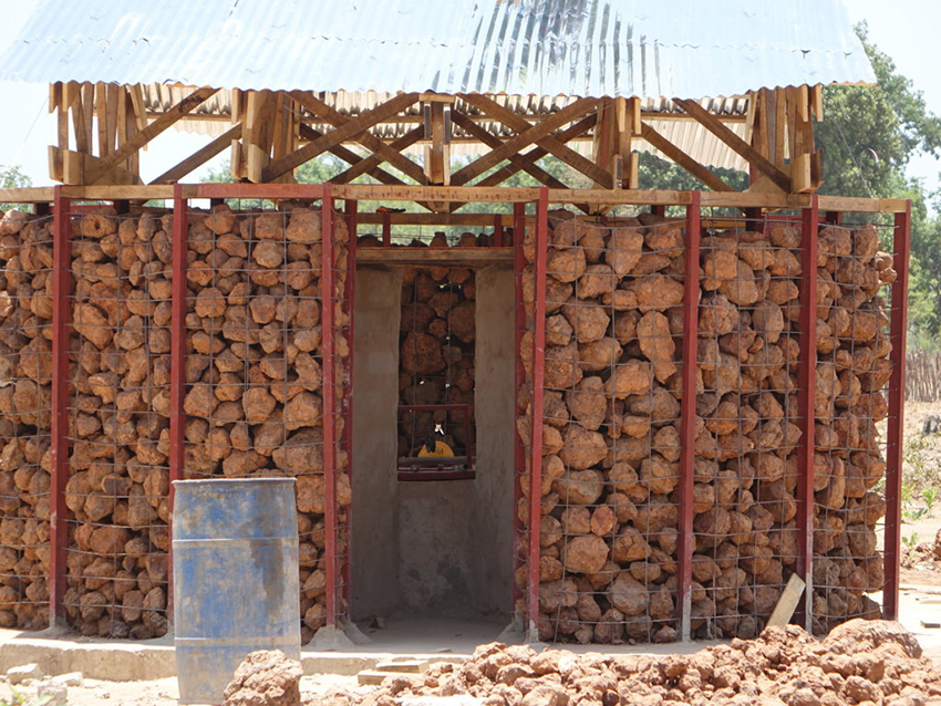 a well with stone architecture to facilitate access to drinking water 12