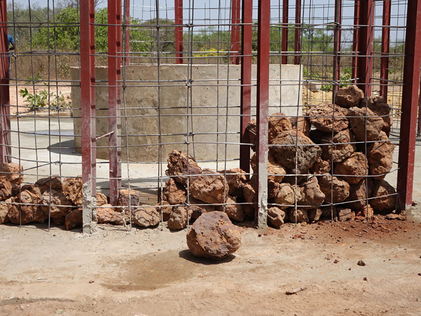 a well with stone architecture to facilitate access to drinking water 3