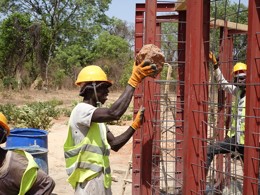 a well with stone architecture to facilitate access to drinking water 4