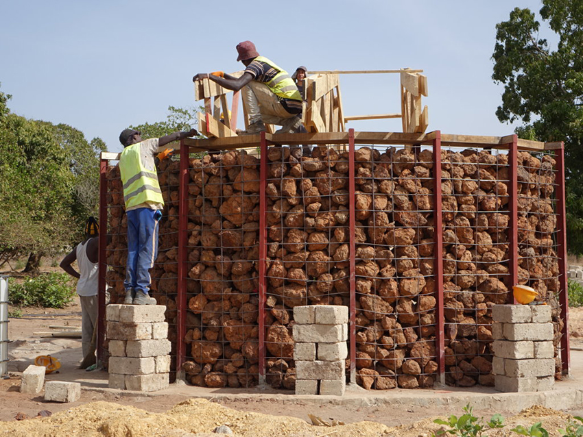 a well with stone architecture to facilitate access to drinking water 8