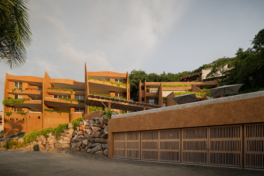 zozaya arquitectos' 'armadillo' residences in mexico capture curves of its namesake creature