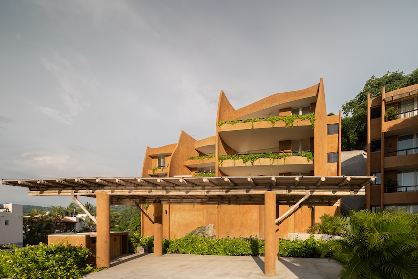 zozaya arquitectos' 'armadillo' residences in mexico capture curves of its namesake creature